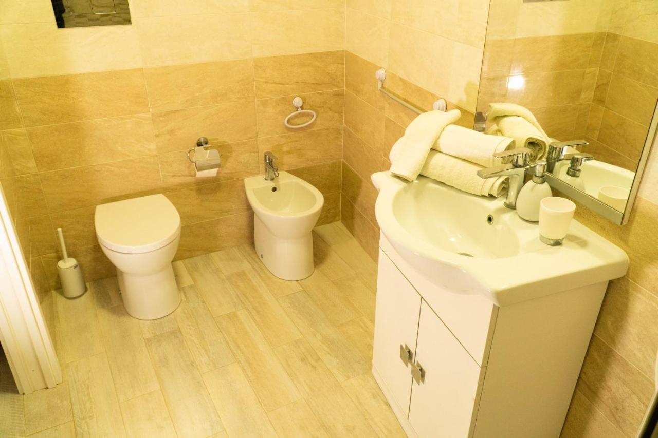 Casa Pandora Rosaapartmentsortigia Hébergement de vacances